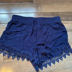 Blue shorts with lace detail
